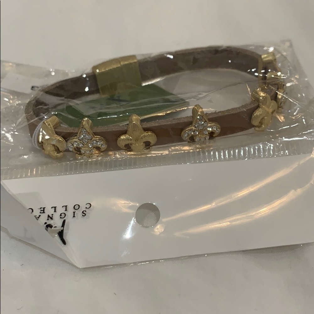 Brown clip bracelet with charms